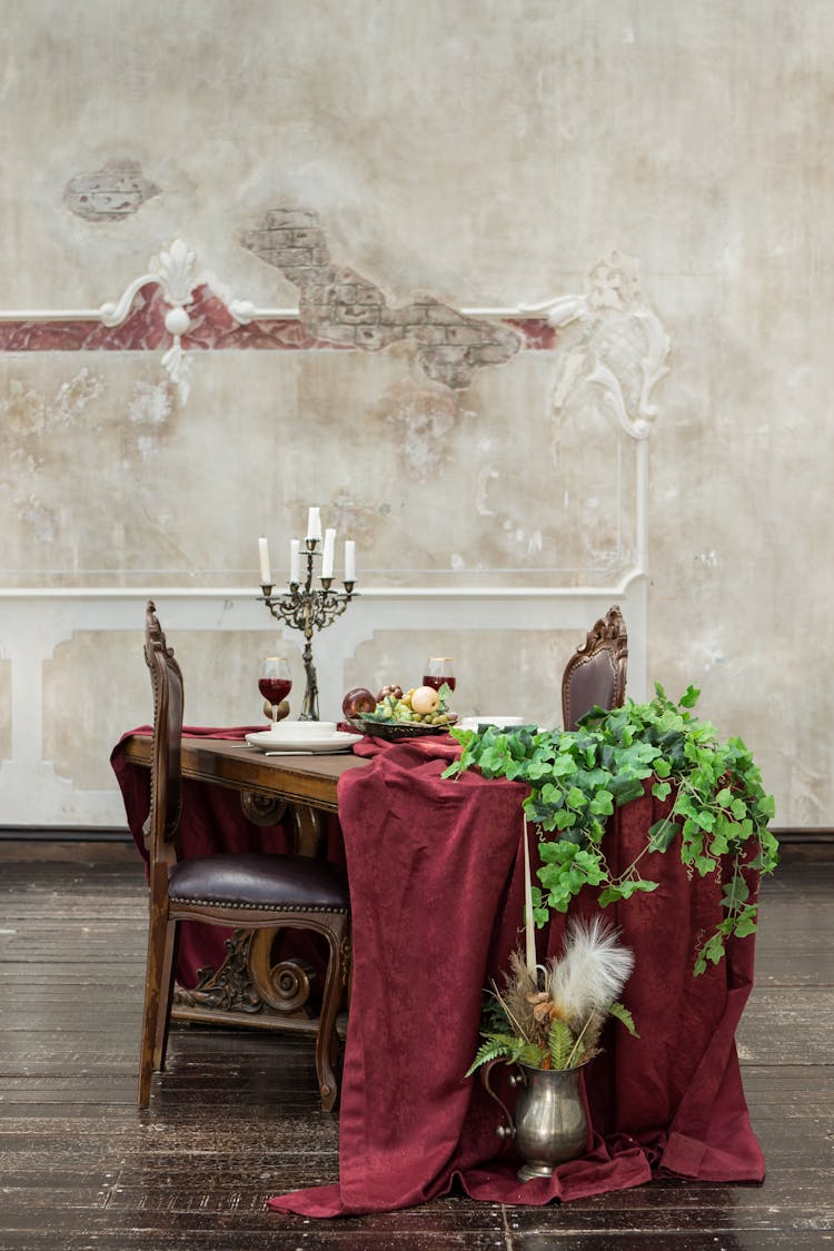 Dinner Served On Antique Table In A Palace Hall