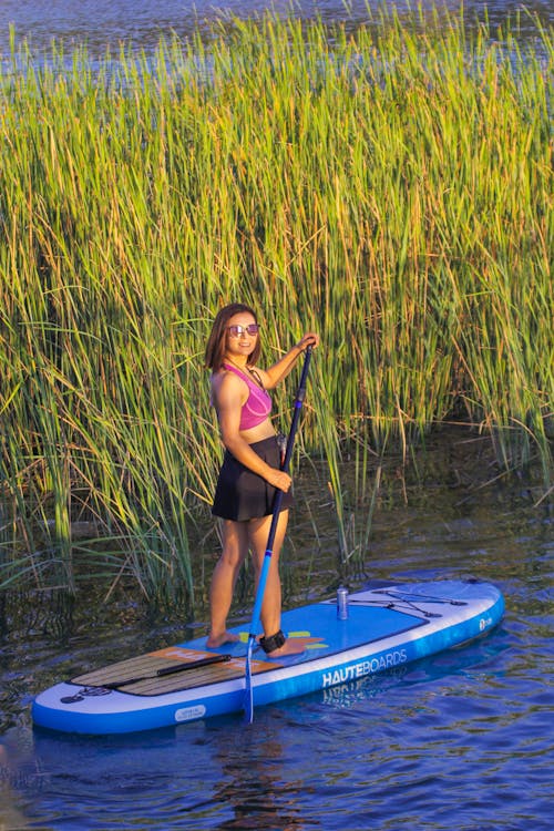 paddleboarding, 休閒, 垂直拍摄 的 免费素材图片