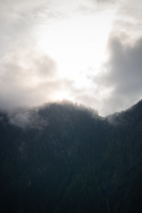 Free A dramatic misty mountain landscape in Mayrhofen, Tirol captured during dawn. Stock Photo
