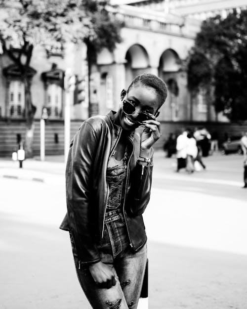 Monochrome Photo of Woman Wearing Leather Jacket