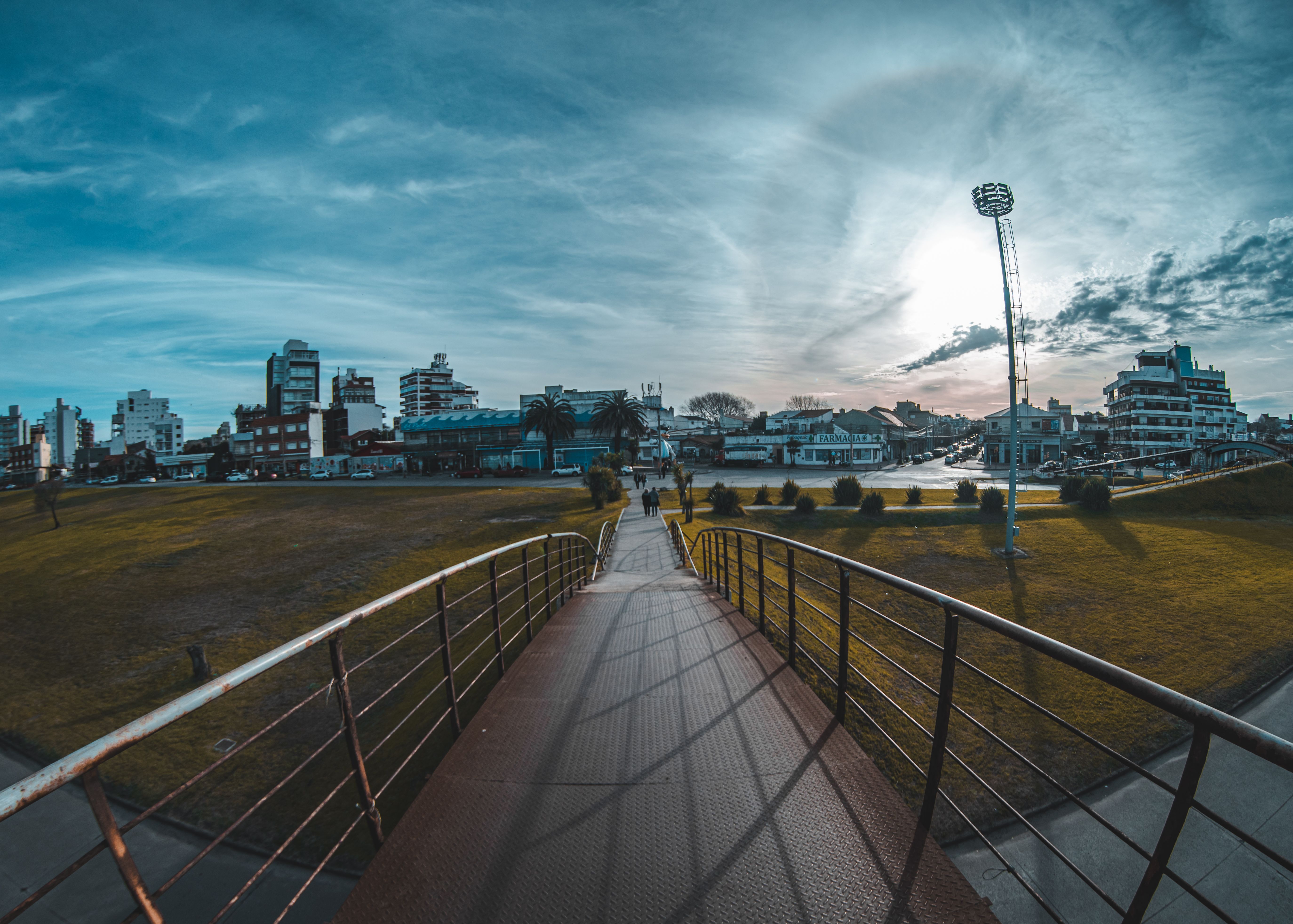 View of a bridge with cityscape in Mar del Plata, Argentina, during the day.