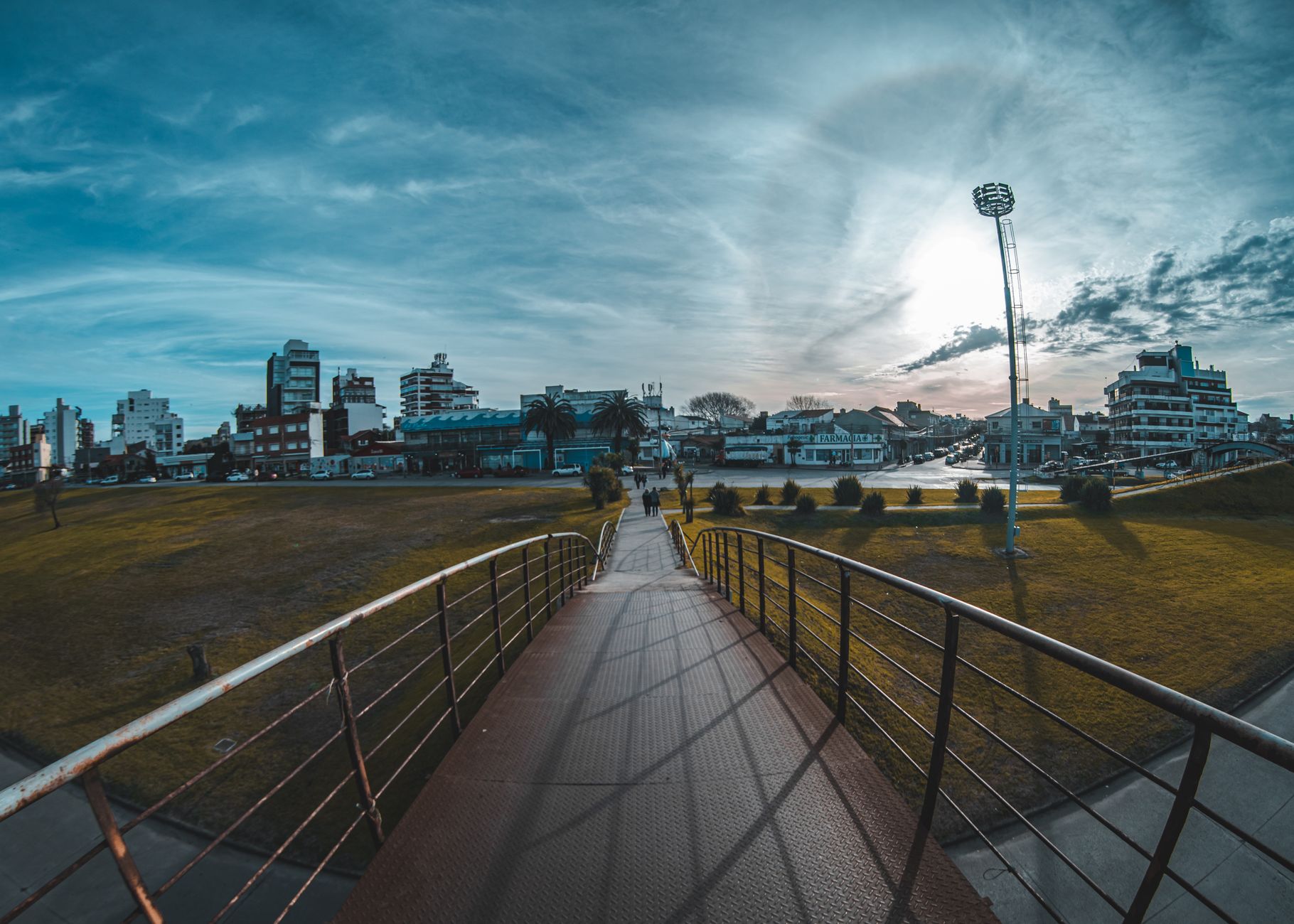 View of a bridge with cityscape in Mar del Plata, Argentina, during the day.
