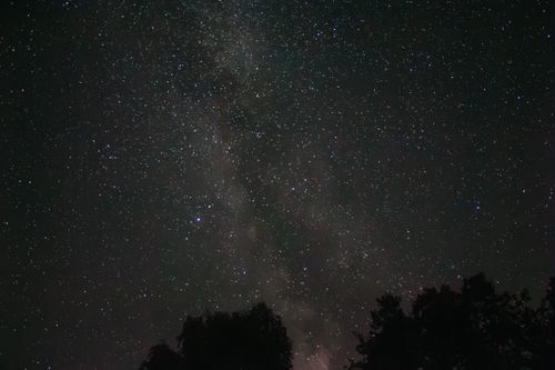 Free Stunning view of the Milky Way galaxy sprawling across a clear night sky. Stock Photo