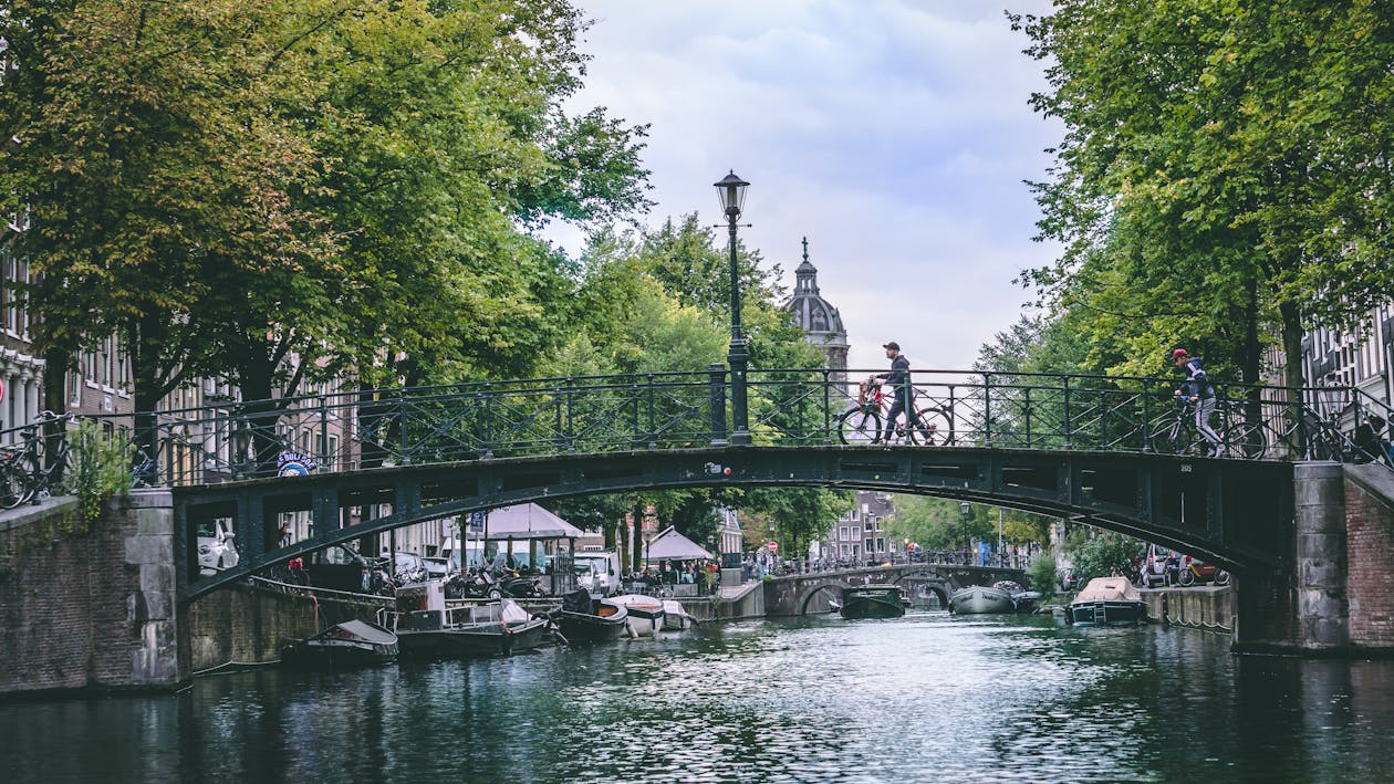 Free Person Crossing The Bridge Stock Photo