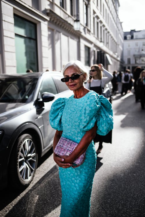 Elderly Woman in Turquoise Dress