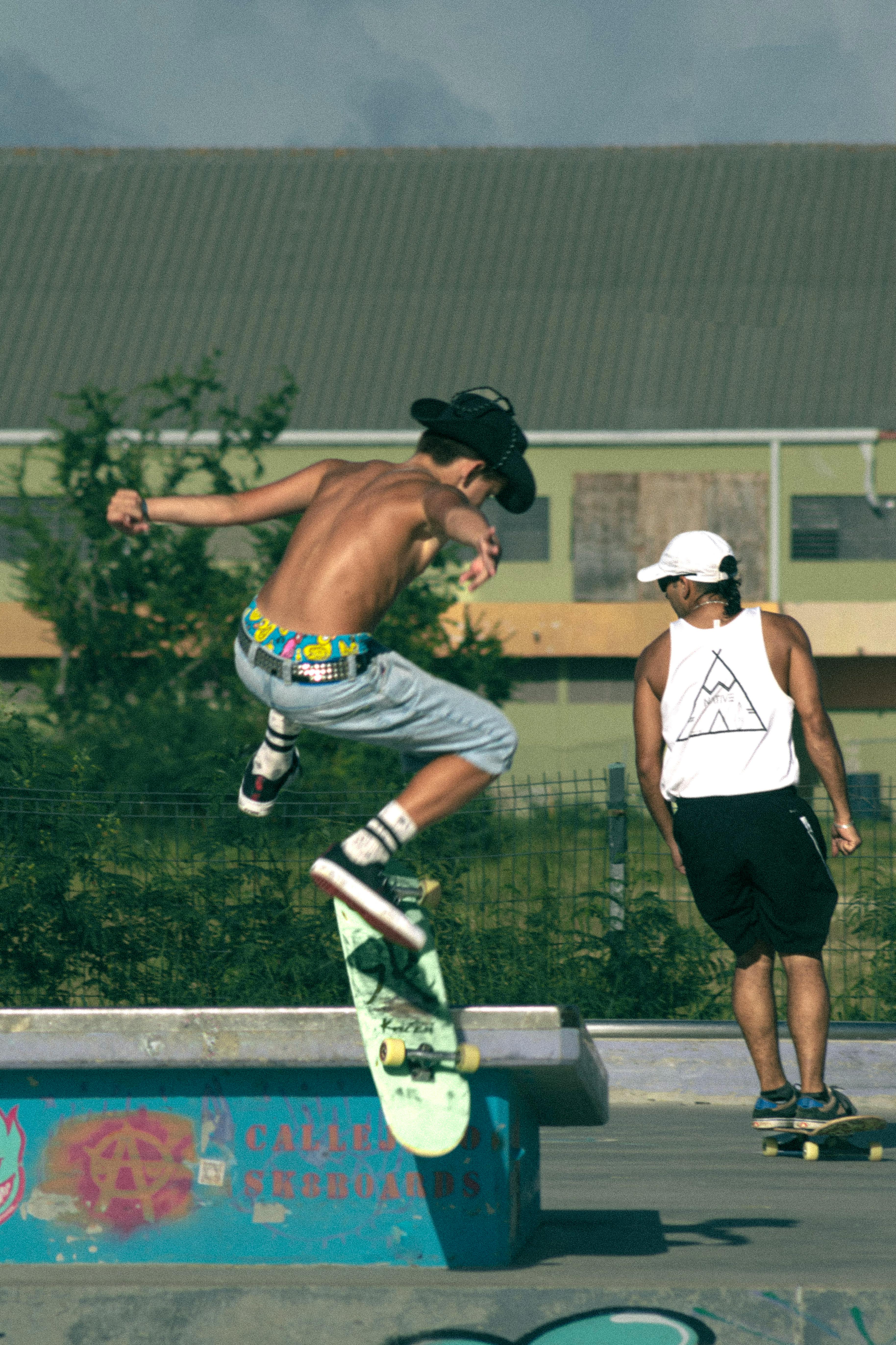 Sunlight over Legs of Person on Skateboard · Free Stock Photo