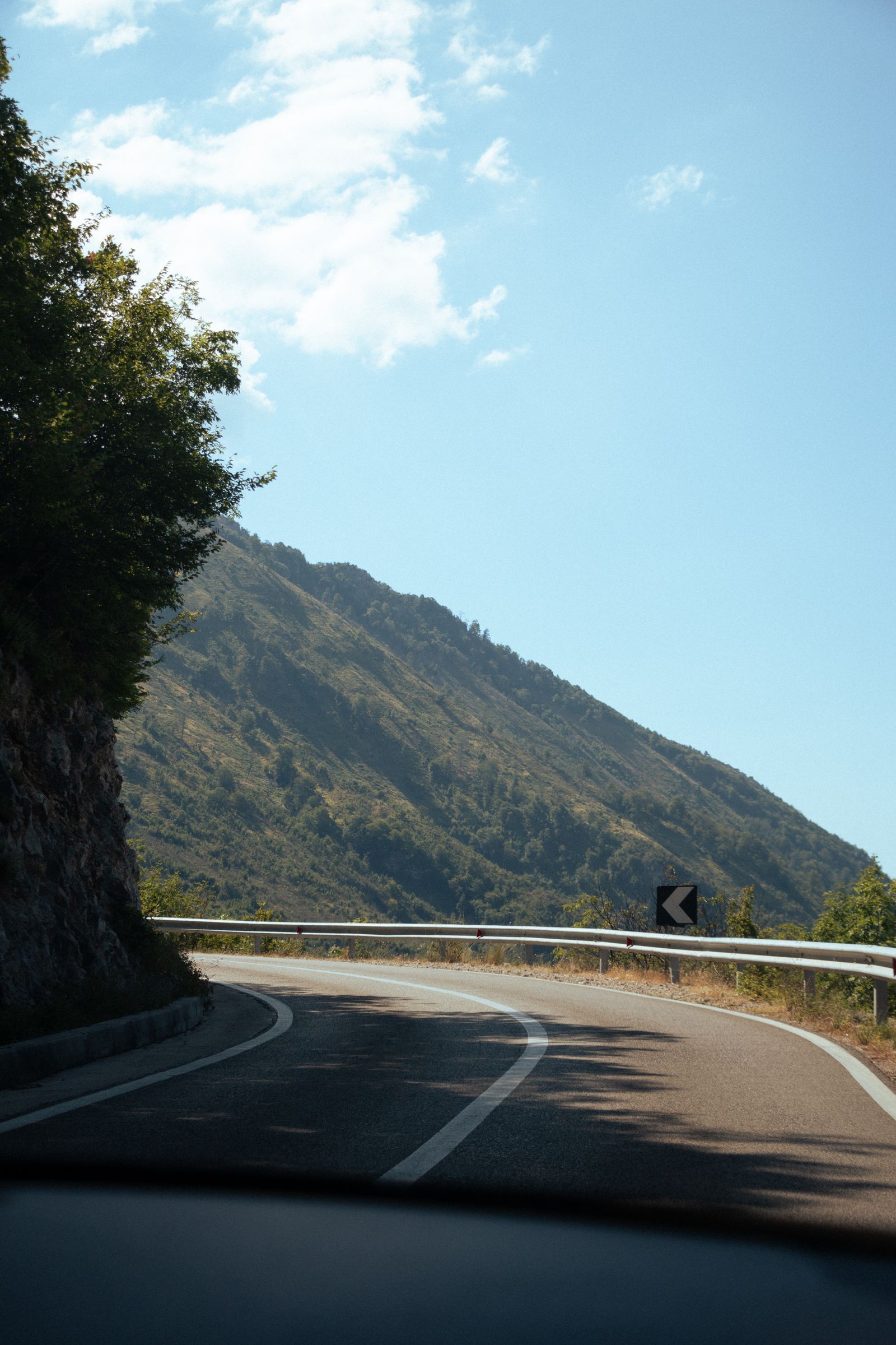 Winding asphalt mountain road near Shëngjergj in Tirana County, Albania