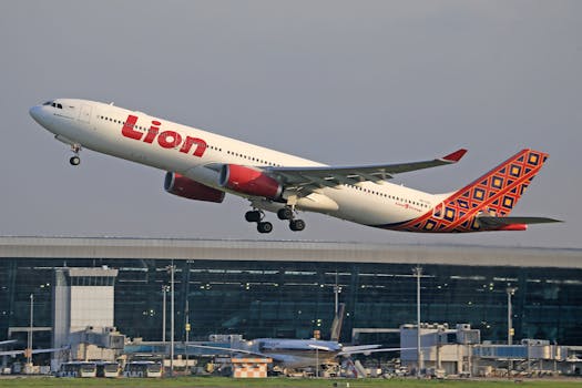 Lion Air Airbus A330 takes off from airport, showcasing flight travel and aviation industry.
