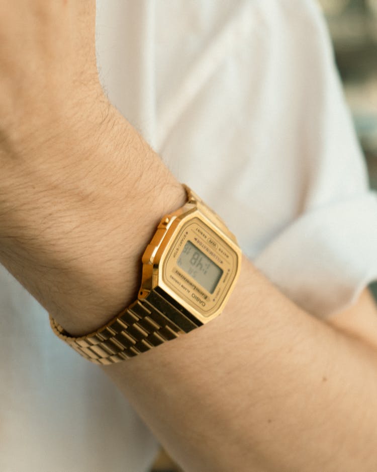 Arm Of A Person Wearing A Digital Wristwatch