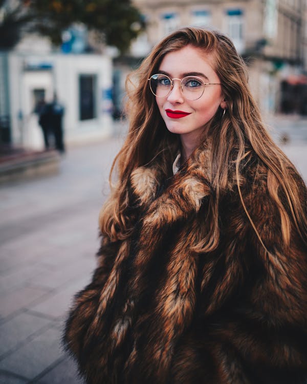 Photo of Woman Wearing Faux Fur Coat
