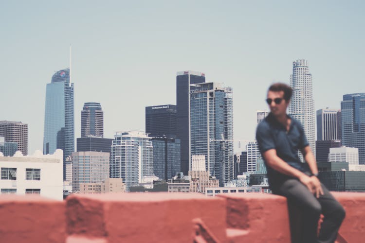 Cityscape With An Out Of Focus Man 