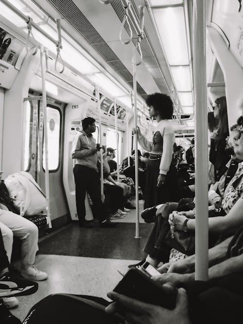 People Riding in Metro Train