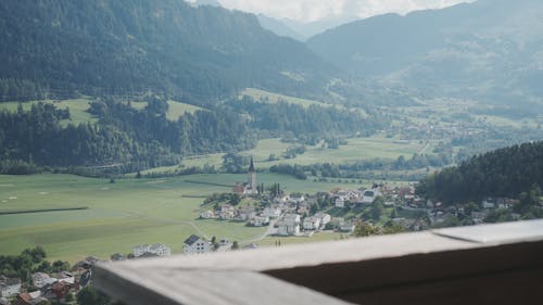 Town with Church in Green Valley