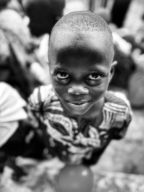 Smiling Boy in Black and White