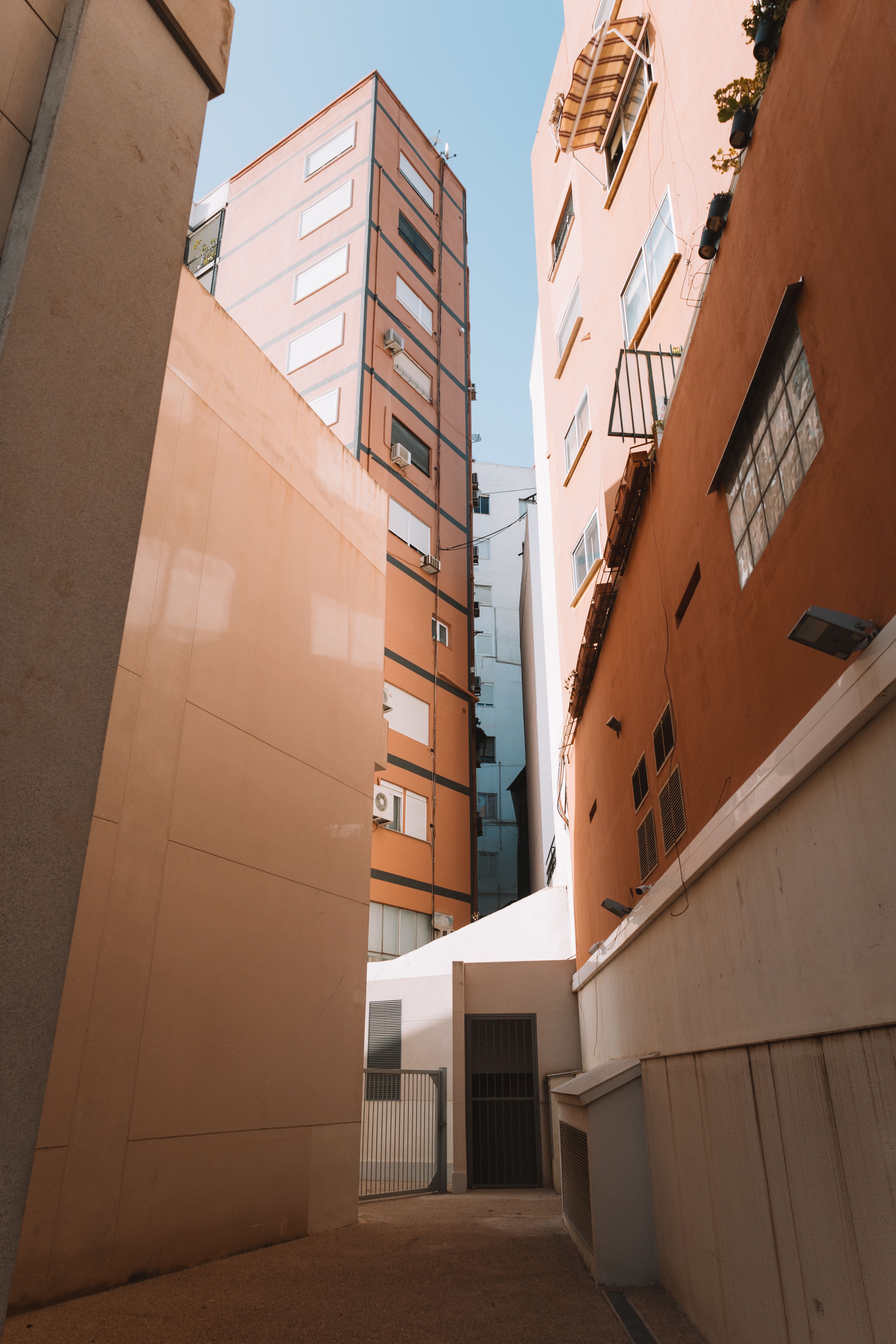 Residential Buildings against Blue Sky · Free Stock Photo