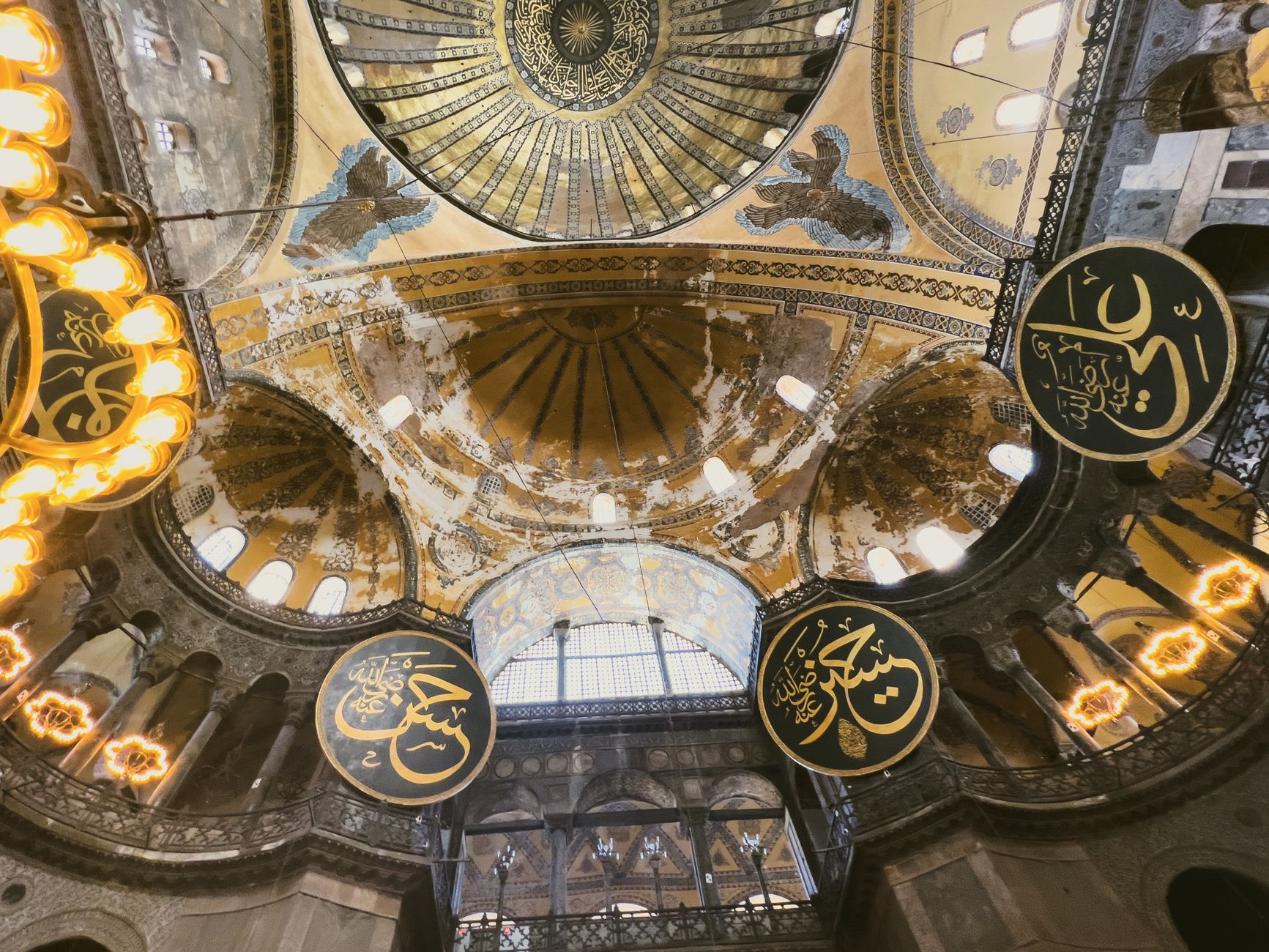 A stunning view inside Hagia Sophia, showcasing its ornate decoration and historic architecture.