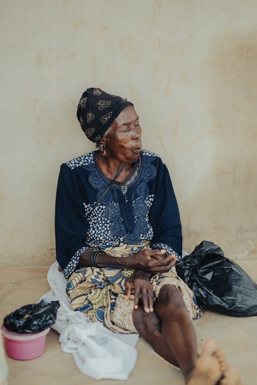 Woman Sitting and Eating