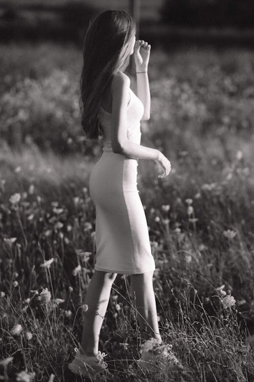 Model in Bodycon Dress in the Meadow