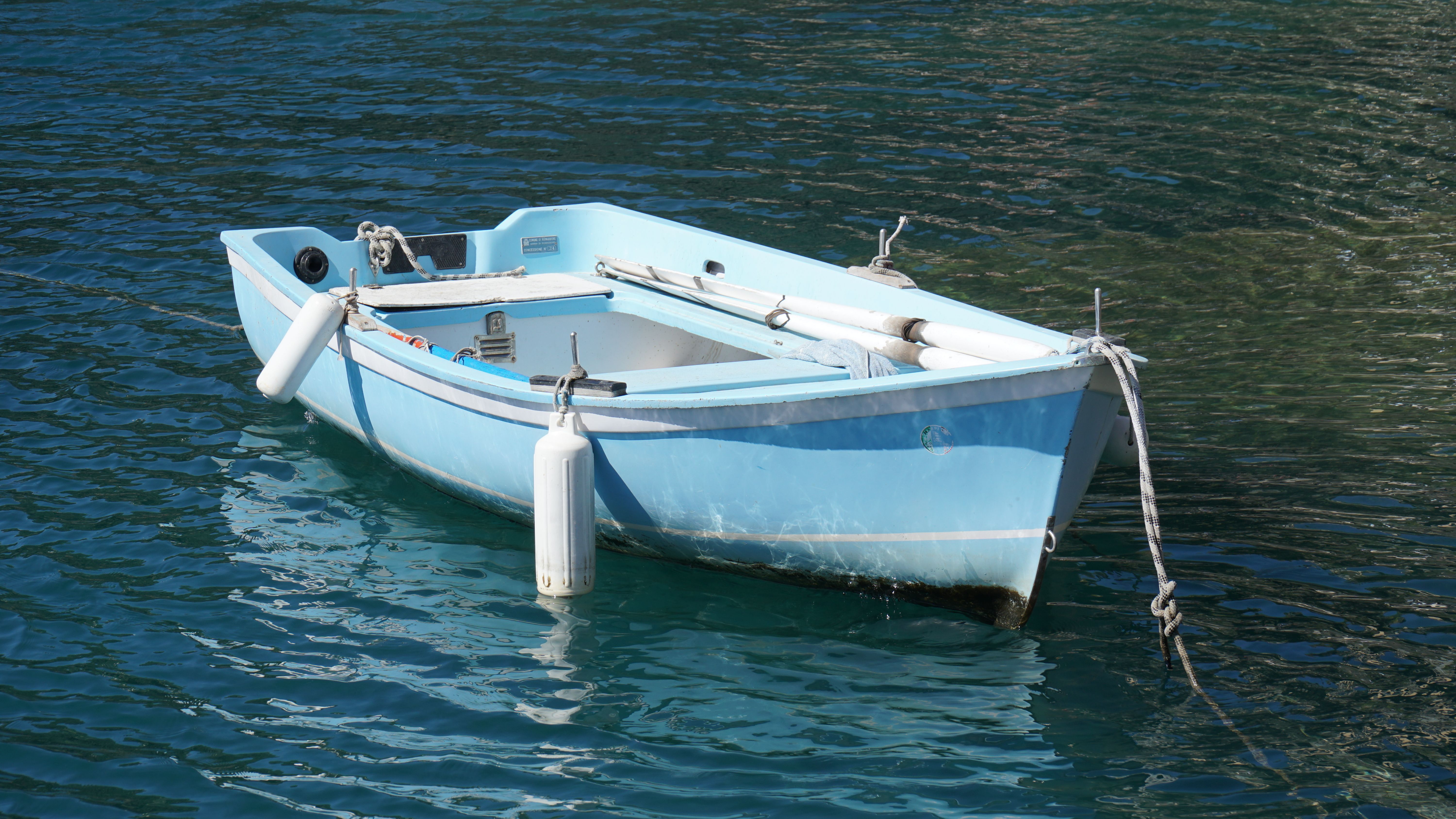 Empty Boat on Anchor in Water · Free Stock Photo