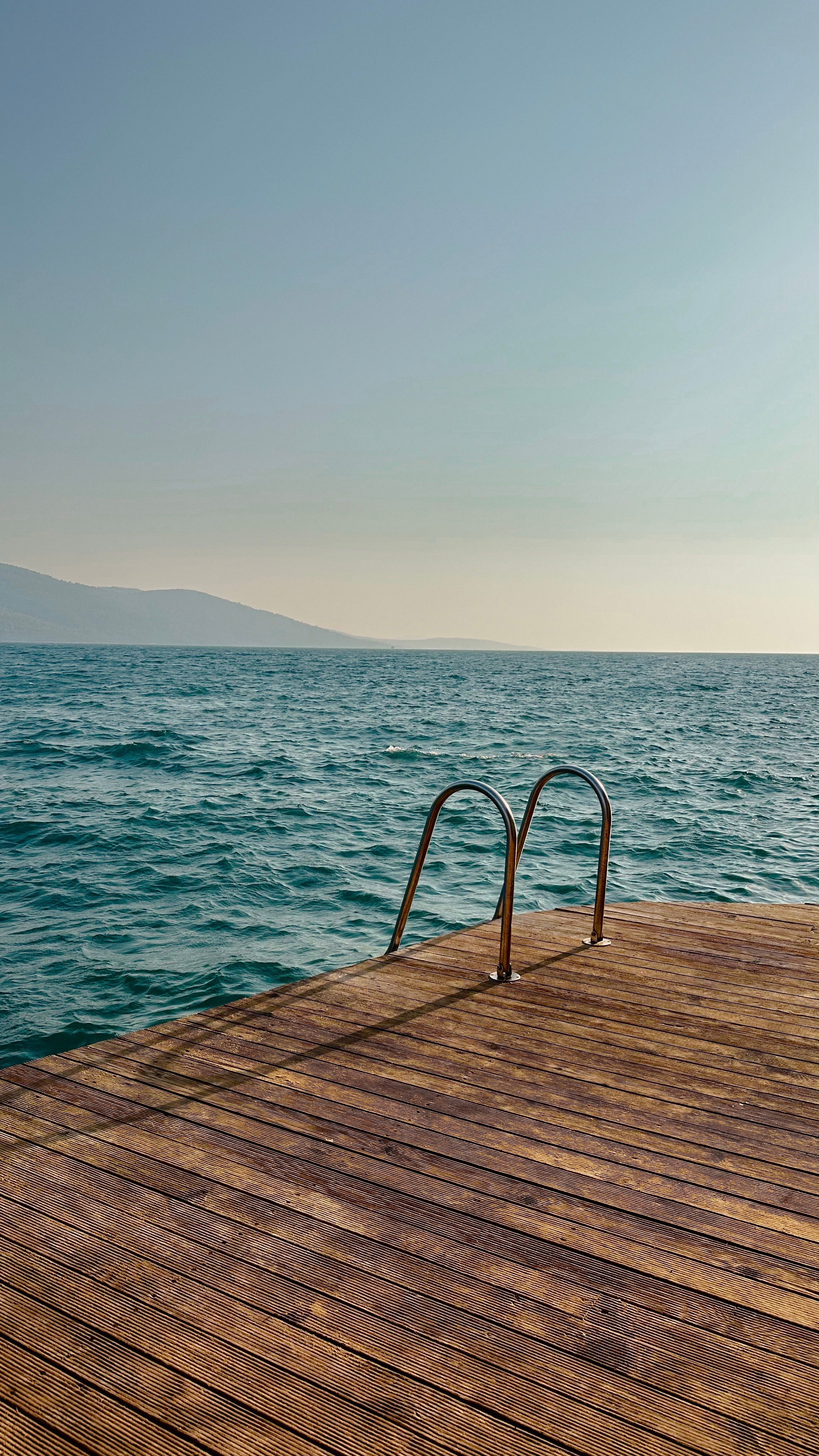 Ladder on Pier on Sea Shore · Free Stock Photo