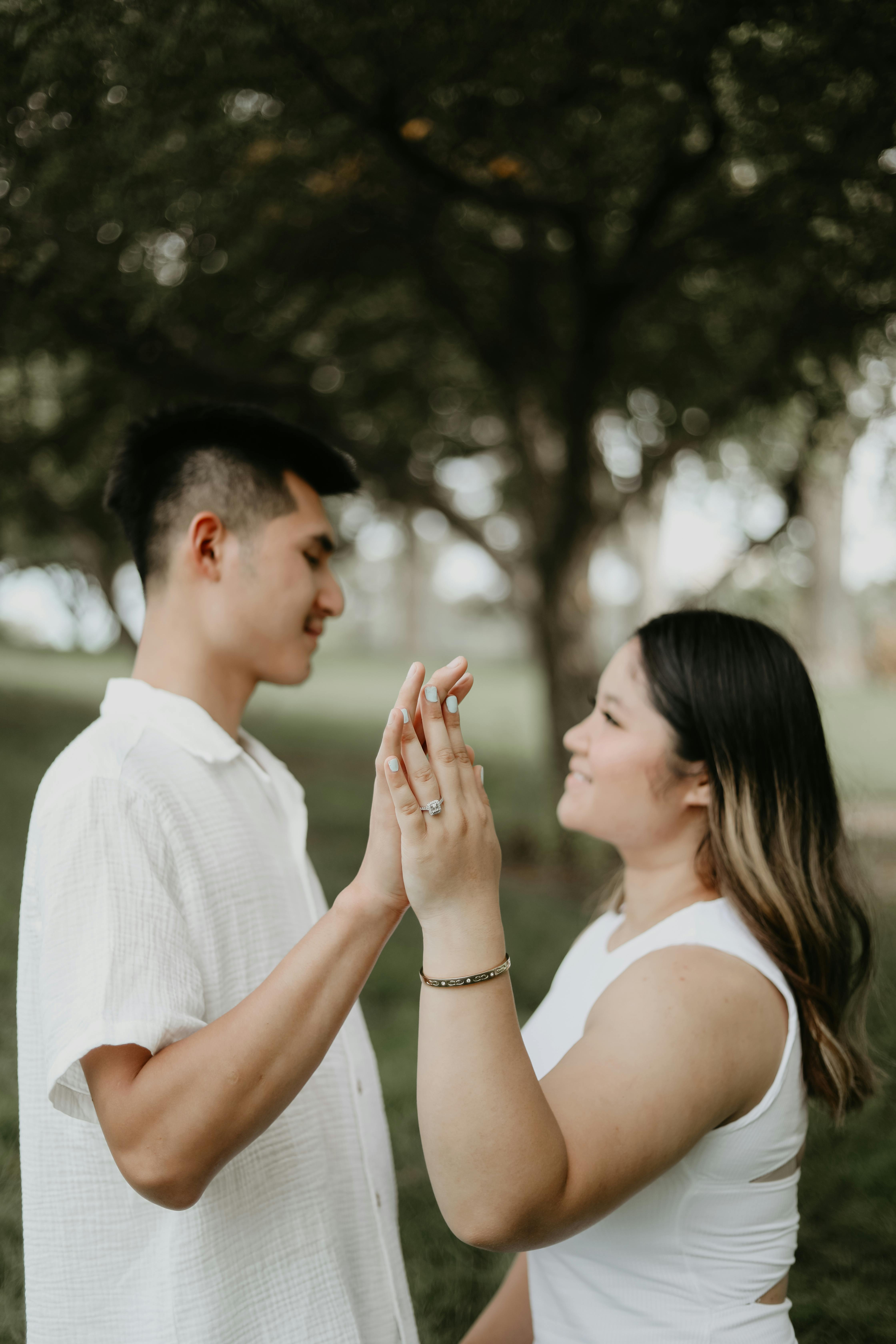 Back View of Couple in Dress and Shirt Holding Hands in Forest · Free ...