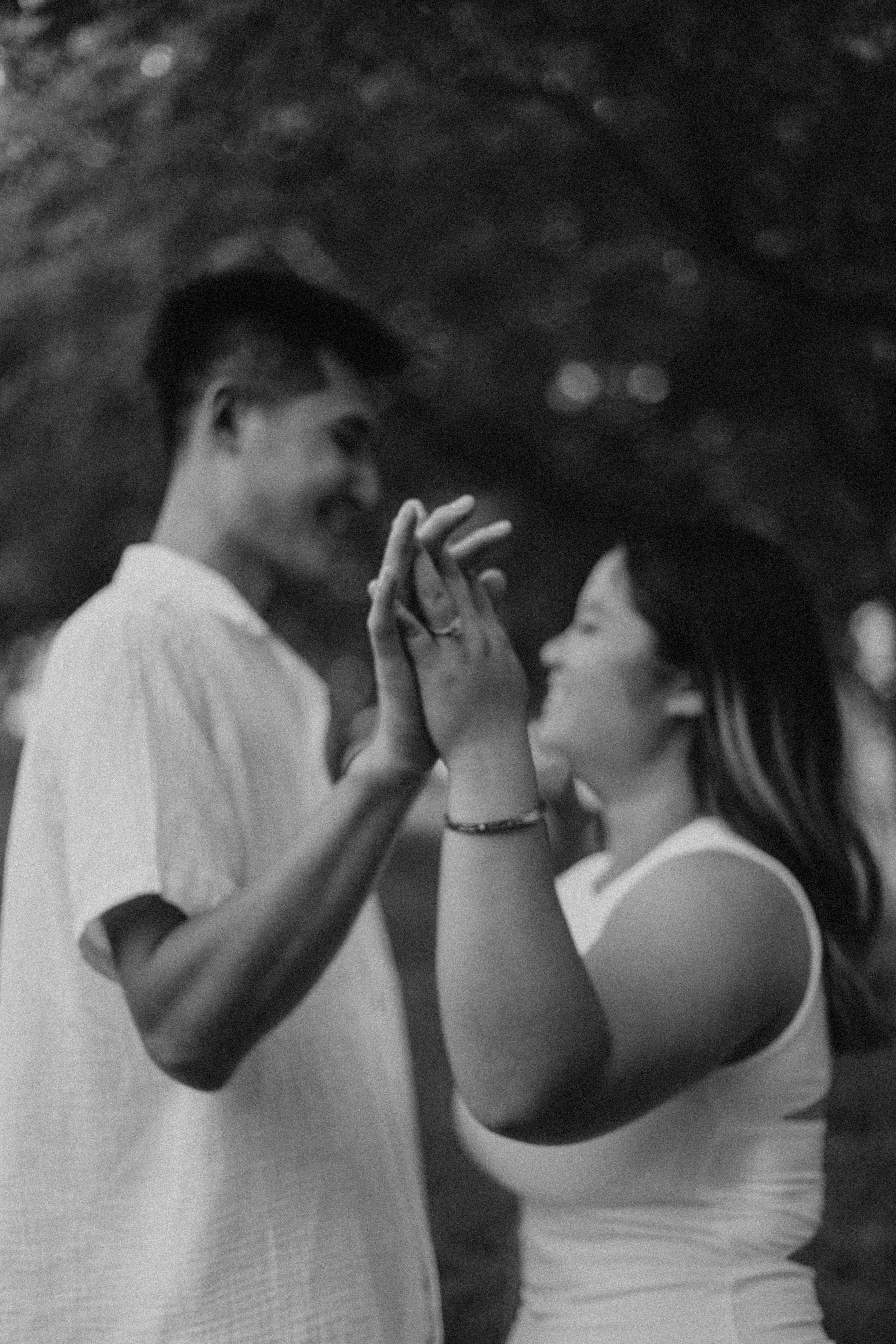 Couple Posing in a Park in Black and White · Free Stock Photo