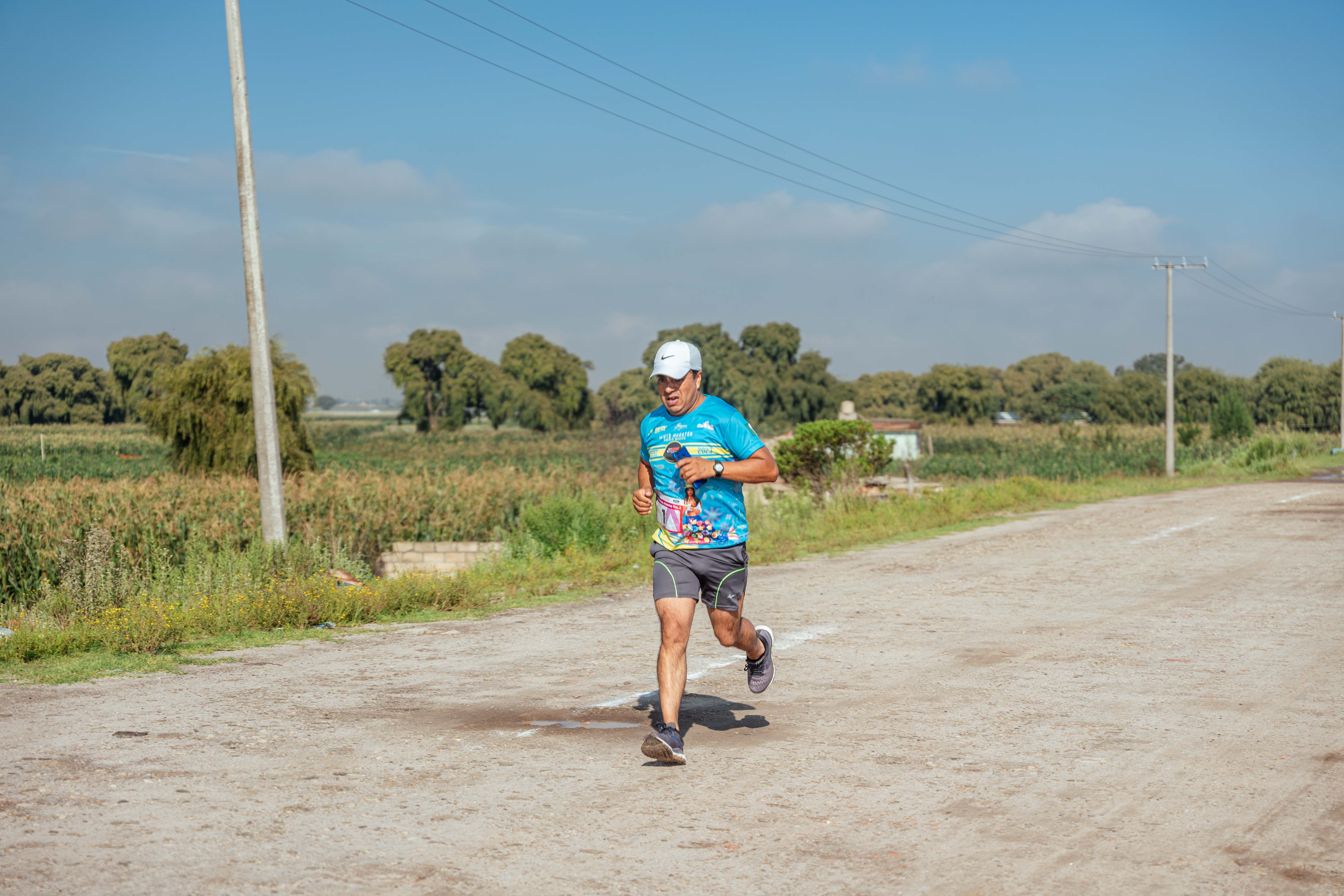 Man Running in Race · Free Stock Photo
