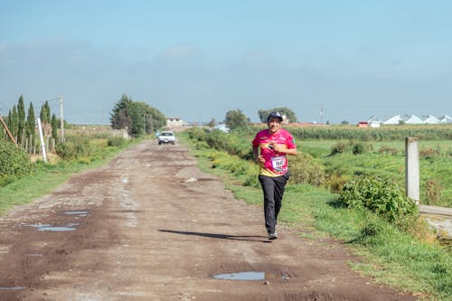 Running Man on Dirt Road