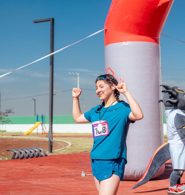 Happy Woman On Finish Line