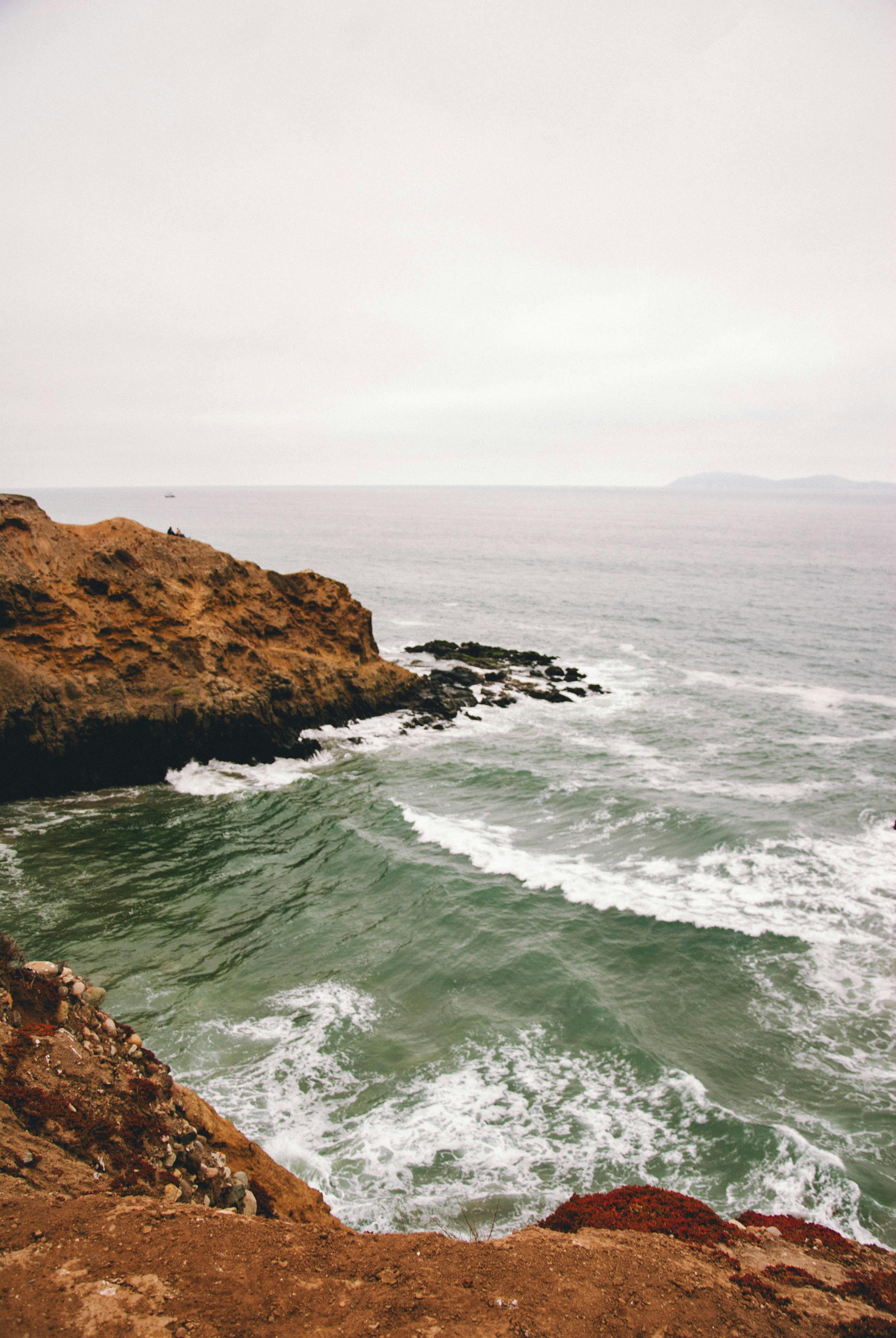 Stunning coastal cliff and ocean view in Rosarito, Mexico capturing natural beauty.
