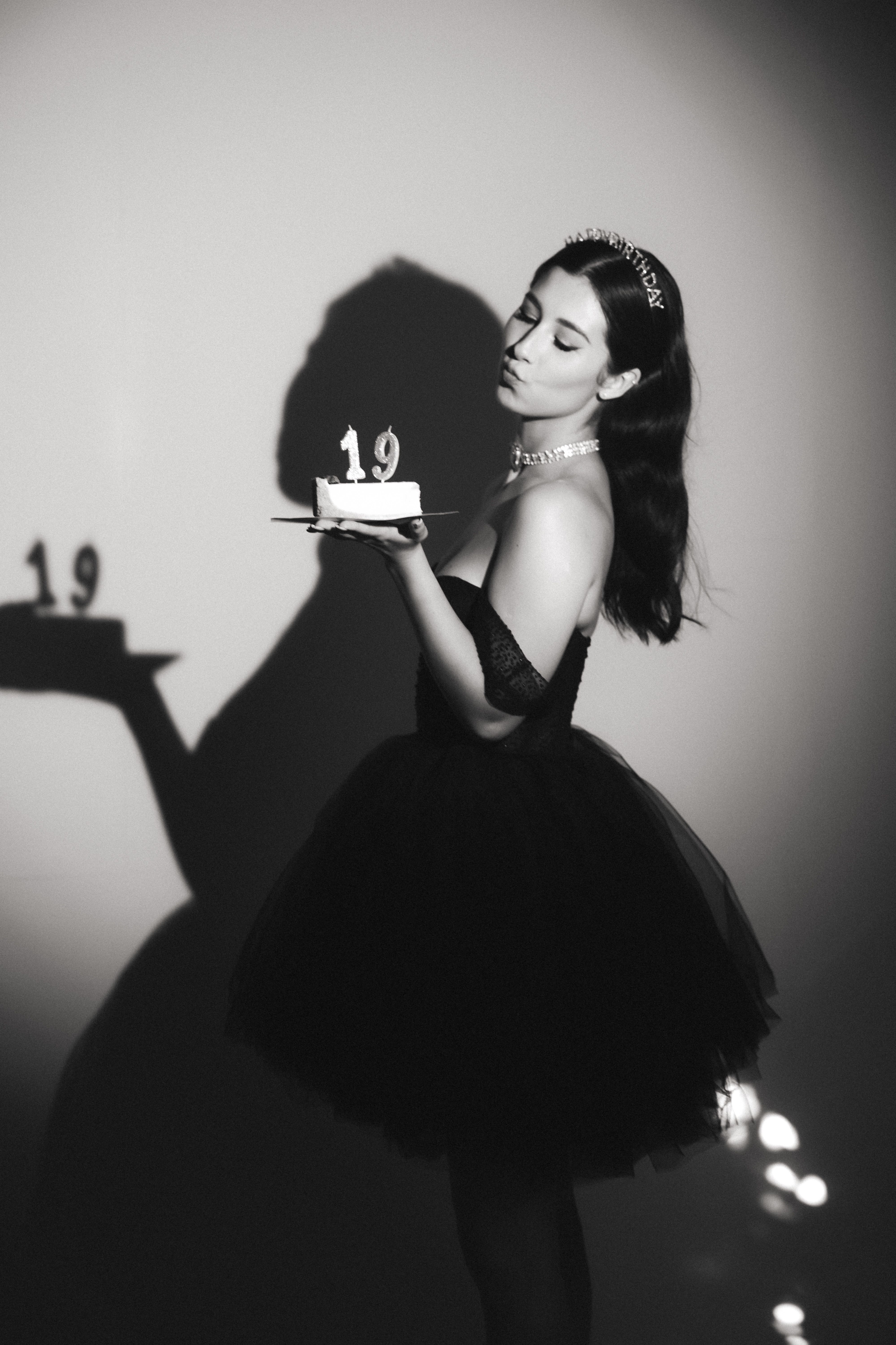 Young Woman in Dress and Crown with Birthday Cake in Studio  Free Stock  Photo
