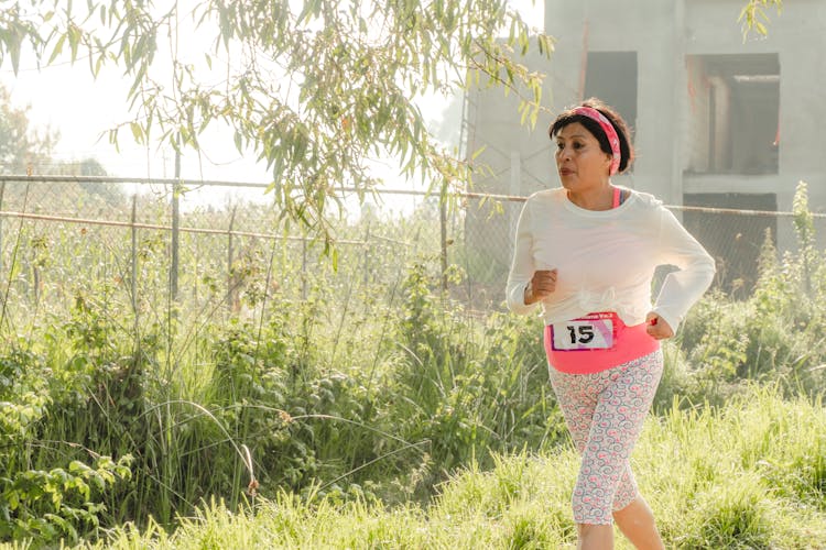 Woman Running In Race