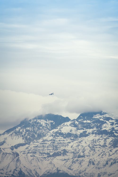 Foto profissional grátis de inverno, montanhas, neblina