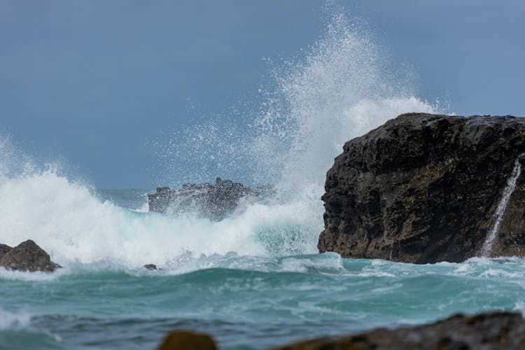 Wave Crushing On Rock On Sea Shore