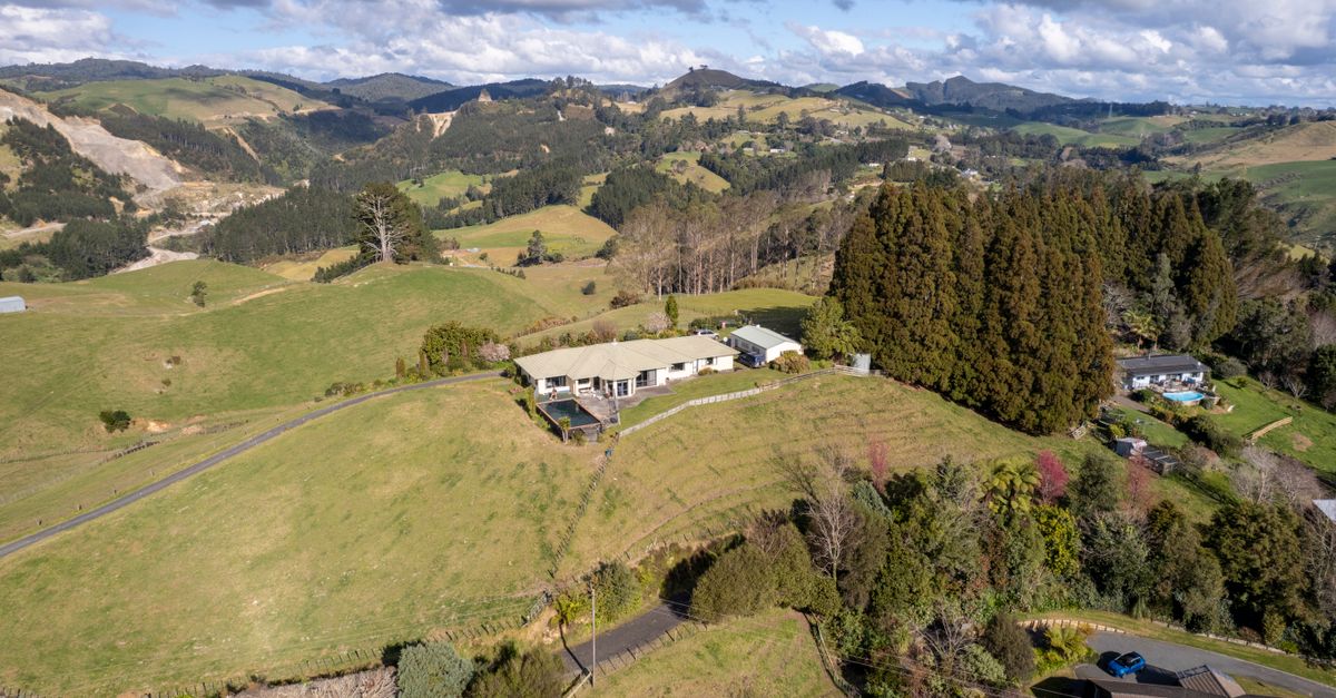 Stunning aerial view of a rural landscape and village in Tauranga, New Zealand.