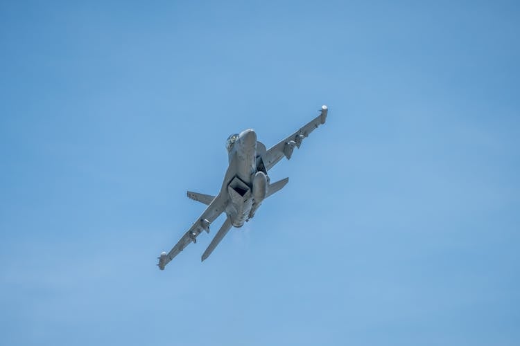 Military Airplane On Clear Sky