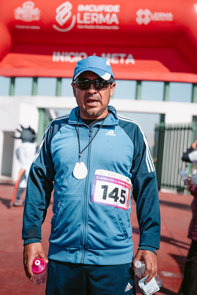 Sportsman With Medal Posing On Meta