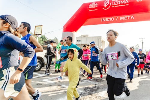 People and Children Running in Race