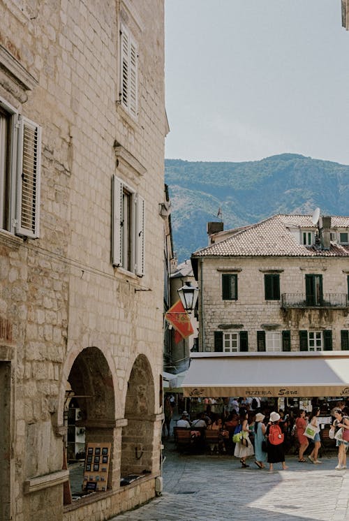 Historical Buildings in the Old Town of a City Surrounded by Mountains 