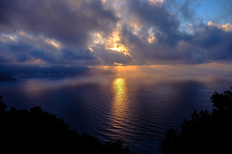 Dramatic sunset over the Ionian Sea in Kefallonia, Greece