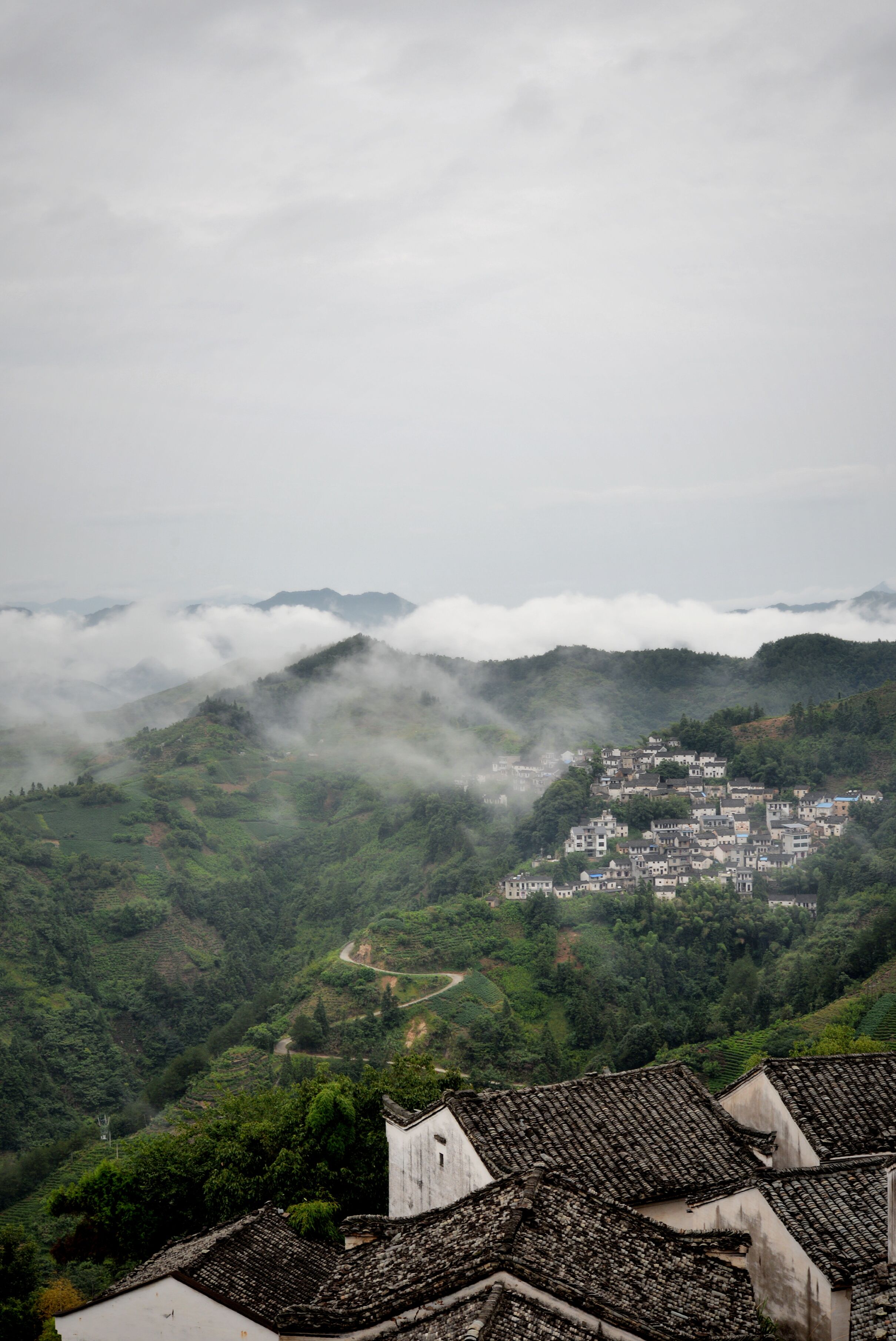 Village with a View of the Mountains Covered with Clouds · Free