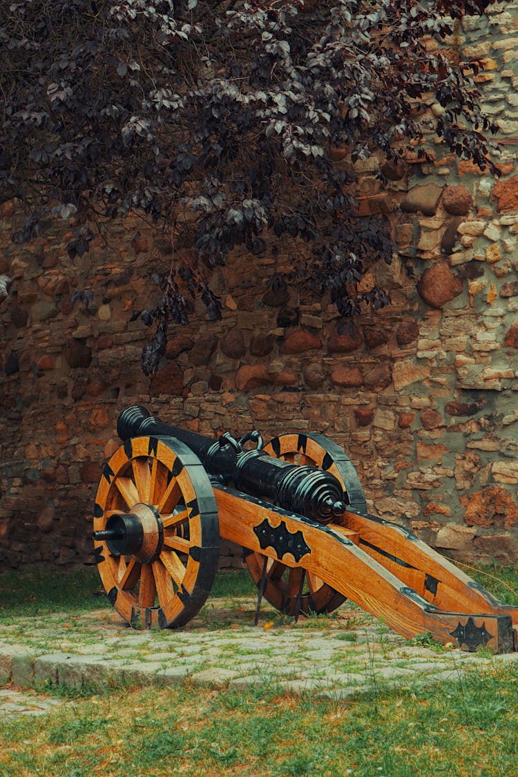 Restored Antique Cannon Next To The Castle Wall