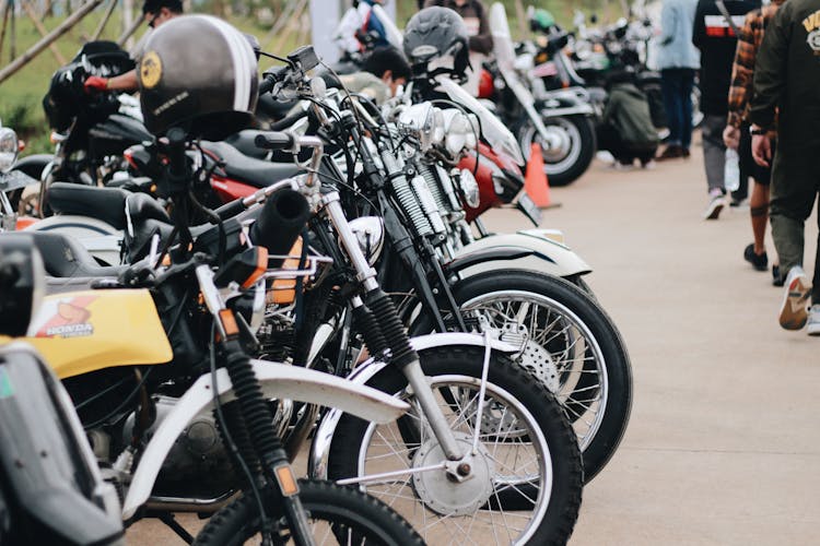 Motorbikes Parked On Asphalt