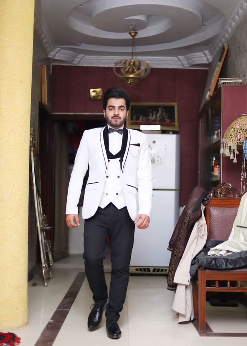 Free Best pose as a groom pakistani 2022 wearing white stuff 3piece Stock Photo
