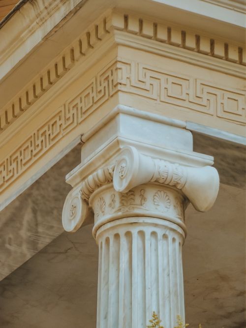Free Close-up of a beautifully decorated classical column showcasing intricate designs and ornate patterns. Stock Photo