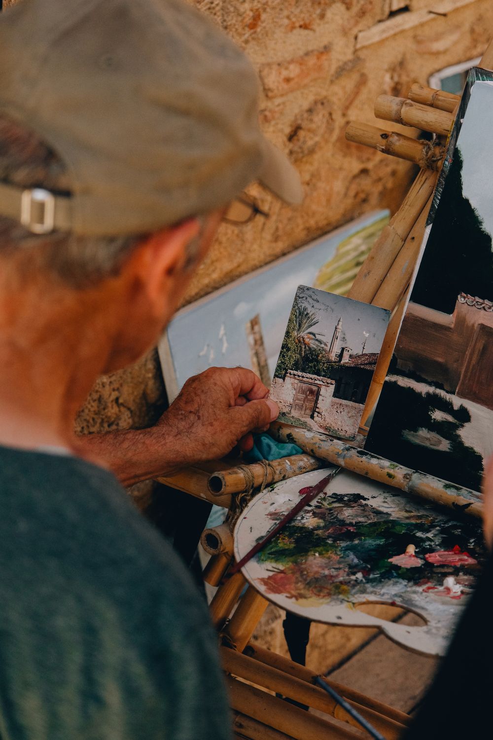 Back View Abstract Art Back View of Artist and Paintings · Free Stock Photo