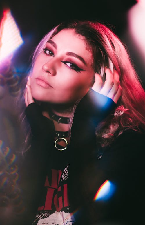 Studio Shot of a Young Woman with Pink Hair 