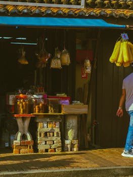 A vibrant street market stall displaying assorted traditional merchandise.