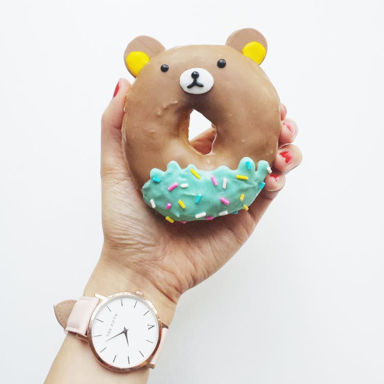 Person Holding Donut