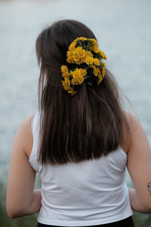 Back View of Woman with Flowers in Hair